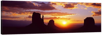 Silhouette of buttes at sunsetMonument Valley, Utah, USA Canvas Art Print - Valley Art