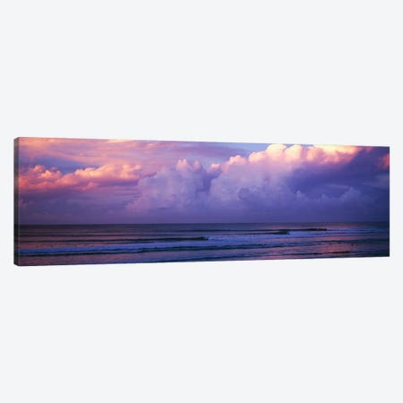 Clouds over the sea at sunset Canvas Print #PIM9043} by Panoramic Images Canvas Wall Art