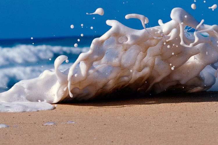 Foam splashing on the beach