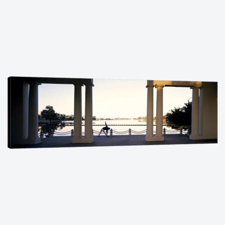 Person stretching near colonnade, Lake Merritt, Oakland, Alameda County, California, USA Canvas Print #PIM9166} by Panoramic Images Canvas Art