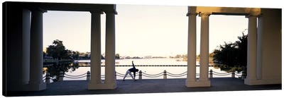 Person stretching near colonnade, Lake Merritt, Oakland, Alameda County, California, USA Canvas Art Print - Column Art
