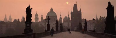 Charles Bridge at dusk with the Church of St. Francis in the backgroundOld Town Bridge Tower, Prague, Czech Republic by Panoramic Images canvas print