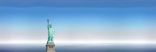Statue Of Liberty: Low angle view of a statue, Statue Of Liberty, Manhattan, New York City, New York State, USA by Panoramic Images