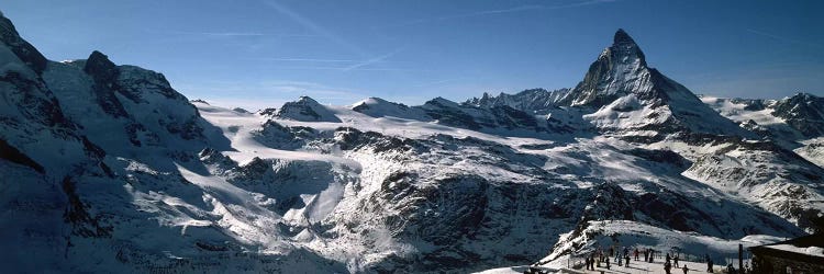 Skiers on mountains in winter, Matterhorn, Switzerland