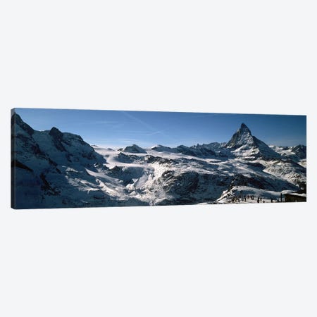 Skiers on mountains in winter, Matterhorn, Switzerland Canvas Print #PIM9210} by Panoramic Images Canvas Art Print