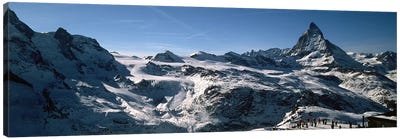 Skiers on mountains in winter, Matterhorn, Switzerland Canvas Art Print - Snowy Mountain Art
