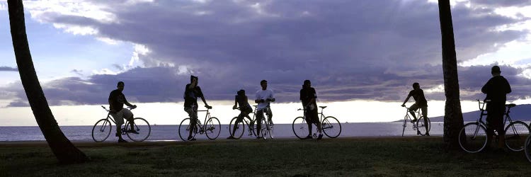 Tourists cycling on the beach, Honolulu, Oahu, Hawaii, USA