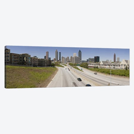 Vehicles moving on the road leading towards the city, Atlanta, Georgia, USA Canvas Print #PIM9253} by Panoramic Images Canvas Art Print
