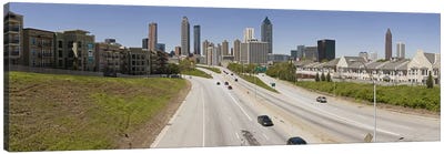 Vehicles moving on the road leading towards the city, Atlanta, Georgia, USA Canvas Art Print - Panoramic Cityscapes