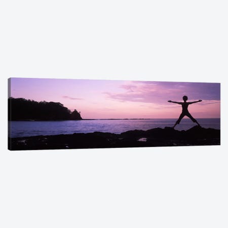 Rear view of a woman exercising on the coast, La Punta, Papagayo Peninsula, Costa Rica Canvas Print #PIM9256} by Panoramic Images Canvas Artwork