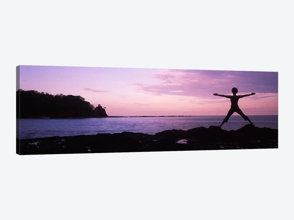 Rear view of a woman exercising on the coast, La Punta, Papagayo Peninsula, Costa Rica by Panoramic Images 1-piece Canvas Print