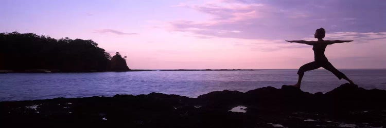 Rear view of a woman exercising on the coast, La Punta, Papagayo Peninsula, Costa Rica #2