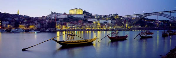 Night Sky: Boats In A River, Douro River, Porto, Portugal by Panoramic Images