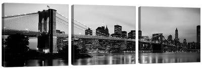 Brooklyn Bridge across the East River at dusk, Manhattan, New York City, New York State, USA Canvas Art Print - 3-Piece Panoramic Art