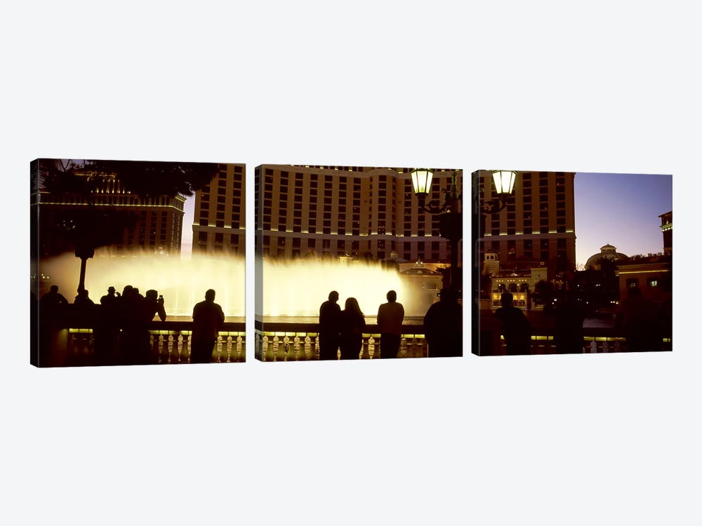 Tourists looking at a fountainLas Vegas, Clark County, Nevada, USA by Panoramic Images 3-piece Canvas Print