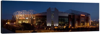 Football stadium lit up at night, Old Trafford, Greater Manchester, England Canvas Art Print