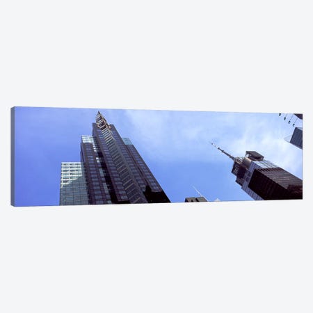 Low angle view of skyscrapers in a city, New York City, New York State, USA 2011 Canvas Print #PIM9755} by Panoramic Images Canvas Art Print