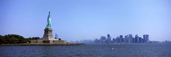 Statue Of Liberty: Statue Of Liberty with Manhattan skyline in the background, Liberty Island, New York City, New York State, USA 2011 by Panoramic Images