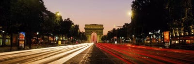 Blurred Motion View Of Nighttime Traffic On Avenue des Champs-Elysees Looking Toward Arc de Triomphe, Paris, France by Panoramic Images canvas print