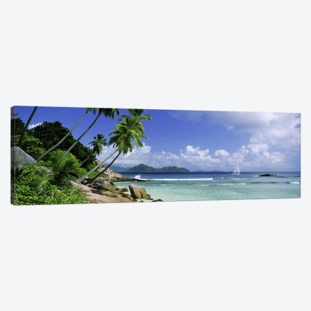 Coastal Landscape With A Distant View Of Praslin Island From Anse Severe Beach, La Digue, Seychelles Canvas Print #PIM9775} by Panoramic Images Canvas Art Print