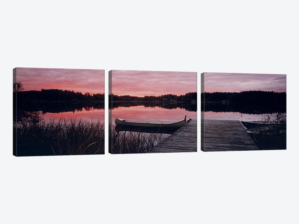 Canoe tied to dock on a small lake at sunset, Sweden by Panoramic Images 3-piece Canvas Artwork
