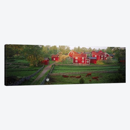 Traditional red farm houses and barns at village, Stensjoby, Smaland, Sweden Canvas Print #PIM9791} by Panoramic Images Canvas Wall Art
