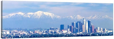 Buildings in a city with snowcapped mountains in the background, San Gabriel Mountains, City of Los Angeles, California, USA Canvas Art Print