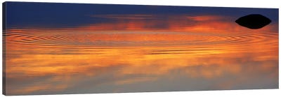 Reflection of clouds with circular ripples spreading outward across glassy lake waters at sunset Canvas Art Print - Lake & Ocean Sunrise & Sunset Art