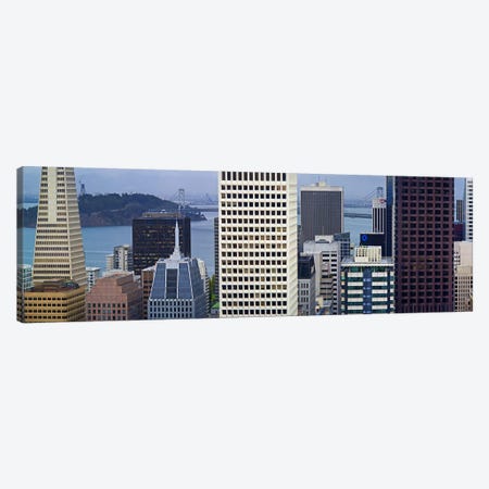 Skyscrapers in the financial district with the bay bridge in the background, San Francisco, California, USA 2011 Canvas Print #PIM9890} by Panoramic Images Canvas Print