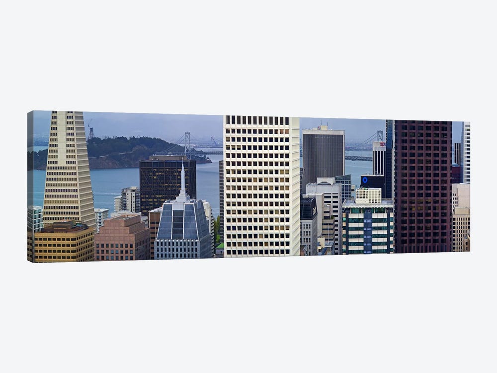 Skyscrapers in the financial district with the bay bridge in the background, San Francisco, California, USA 2011 by Panoramic Images 1-piece Art Print