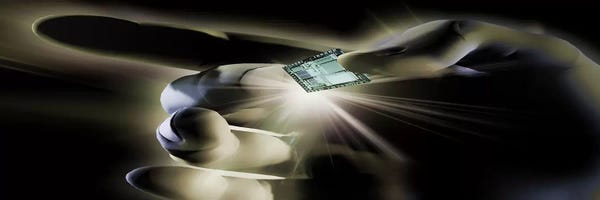 Close-up of a person's hand holding micro chip