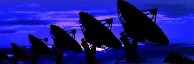 Silhouette of satellite dishes by Panoramic Images canvas print