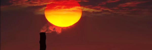 Industrial: Smoke stack in sunset by Panoramic Images