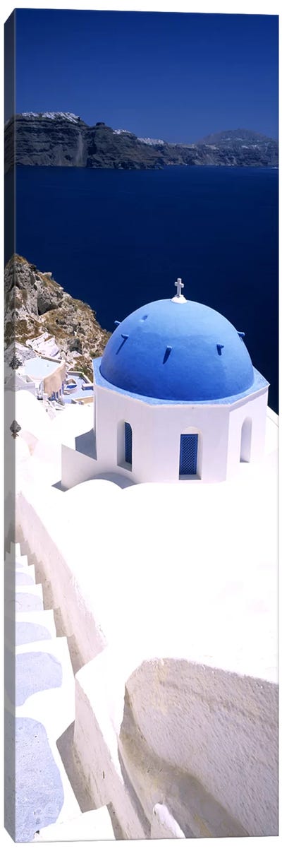 High angle view of a church with blue dome, Oia, Santorini, Cyclades Islands, Greece Canvas Art Print