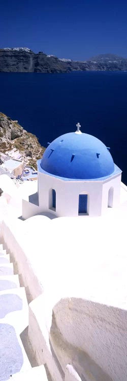 High angle view of a church with blue dome, Oia, Santorini, Cyclades Islands, Greece