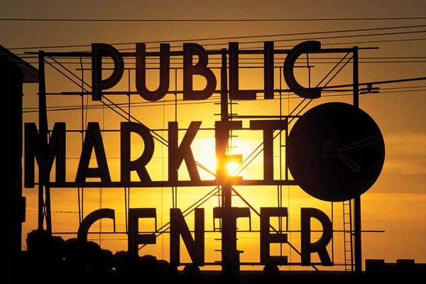 Public Market Center Neon Sign And Clock Silhouette In Front Of A Rising Sun, Pike Place Market, Seattle, Washington, USA