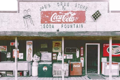 Coca Cola Shop Red by Pixy Paper framed canvas print