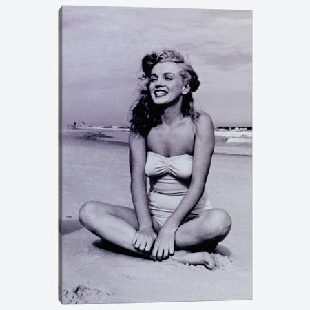 A Young, Smiling Marilyn Monroe Sitting On The Beach Canvas Print #RAD119} by Radio Days Canvas Art