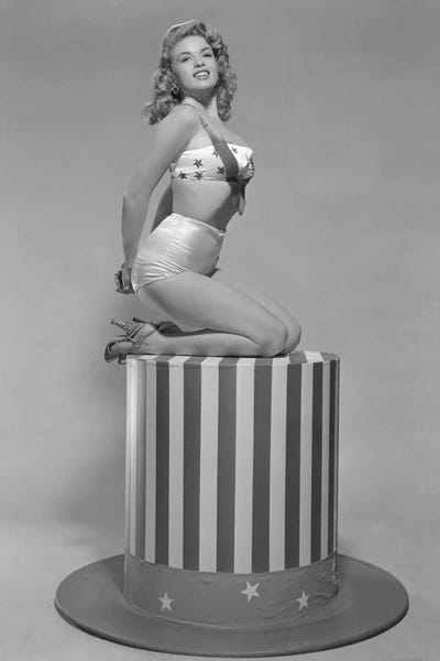 American Décor: Jayne Mansfield Kneeling On A Hat by Radio Days