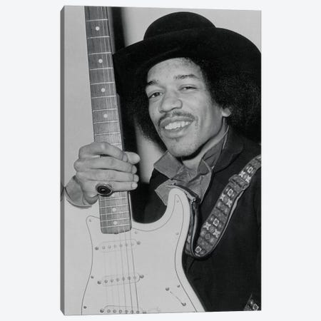 A Smiling Jimi Hendrix Holding His Guitar Canvas Print #RAD53} by Radio Days Canvas Print