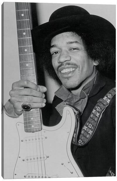 A Smiling Jimi Hendrix Holding His Guitar Canvas Art Print - Black & White Pop Culture Art