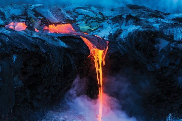 Lava flow entering the ocean at dawn, Hawaii Volcanoes National Park, The Big Island, Hawaii, USA.