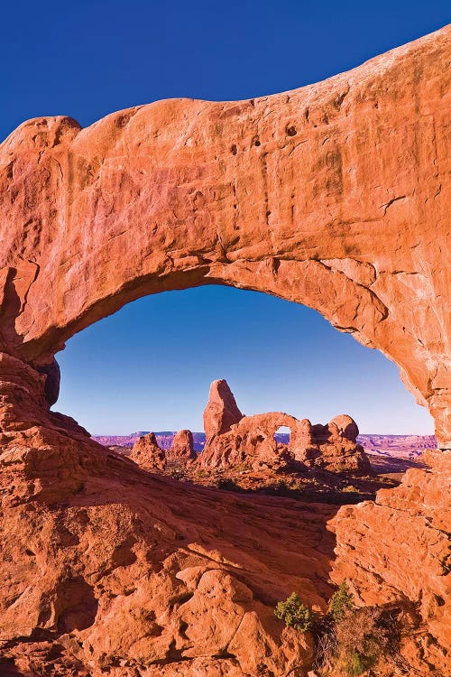 Morning light on Turret Arch through North Window, Arches National Park, Utah, USA