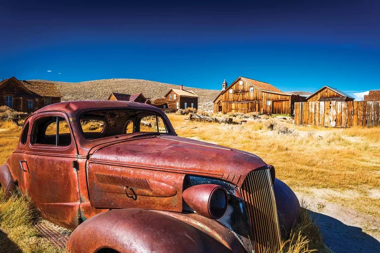 Rusted car and buildings, Bodie State Historic Park, California, USA by Russ Bishop wall art