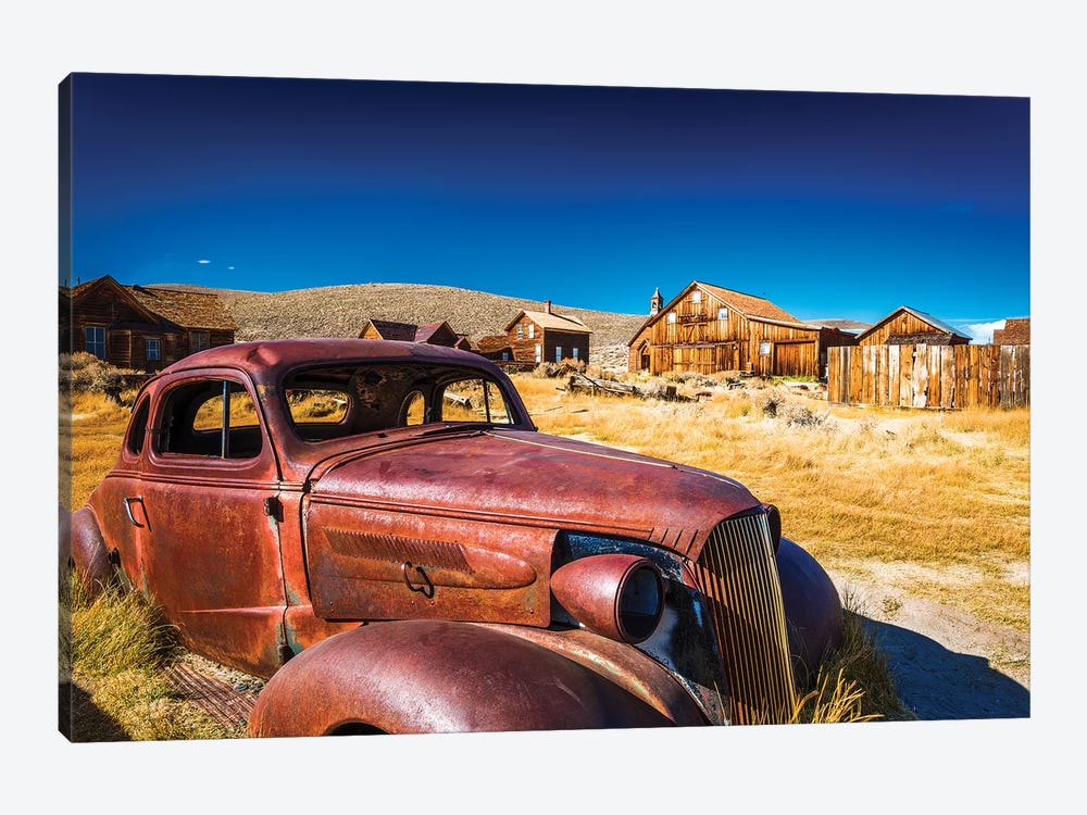 Rusted car and buildings, Bodie State Historic Park, California, USA by Russ Bishop 1-piece Canvas Wall Art