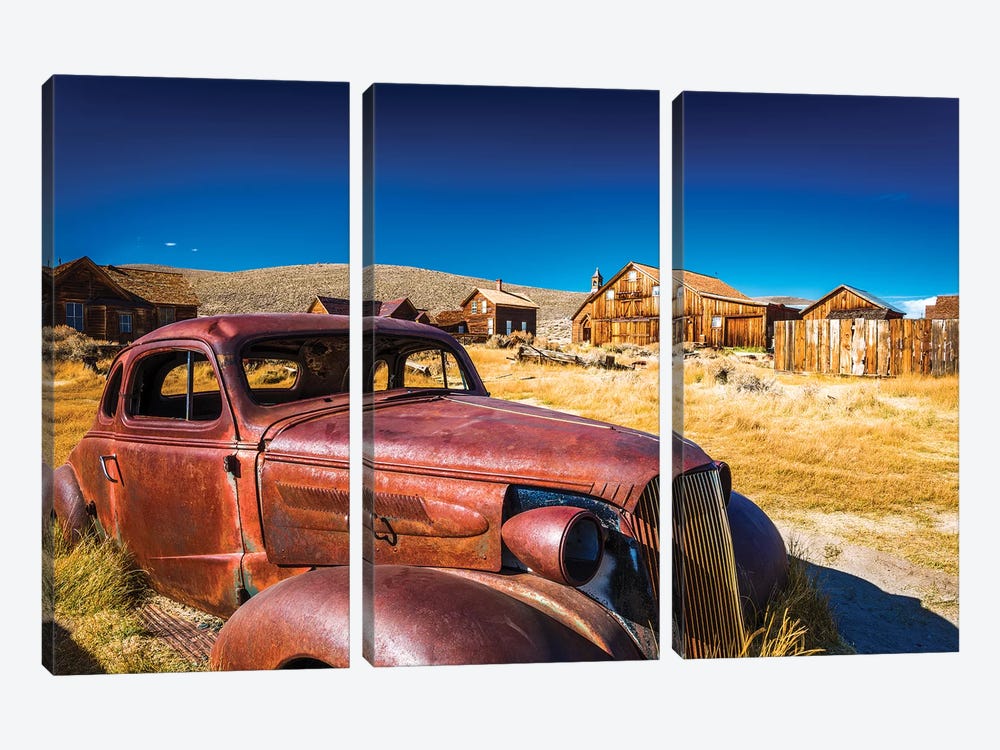 Rusted car and buildings, Bodie State Historic Park, California, USA by Russ Bishop 3-piece Canvas Artwork