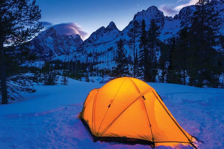 Winter camp at dusk under the Tetons, Grand Teton National Park, Wyoming, USA