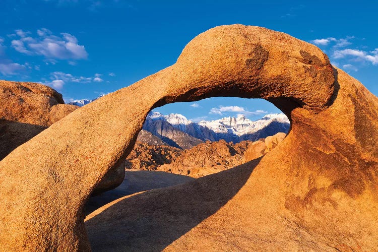 Dawn light on Mount Whitney through Mobius Arch, Alabama Hills, California, USA