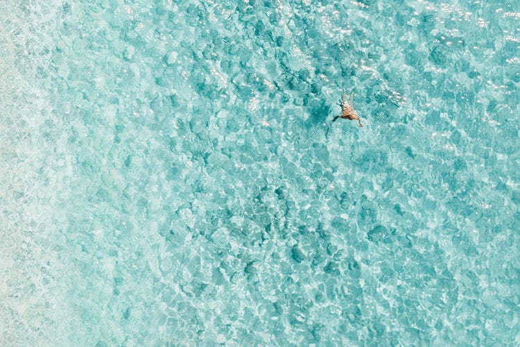 Aerial View Of People Swimming In Ocean