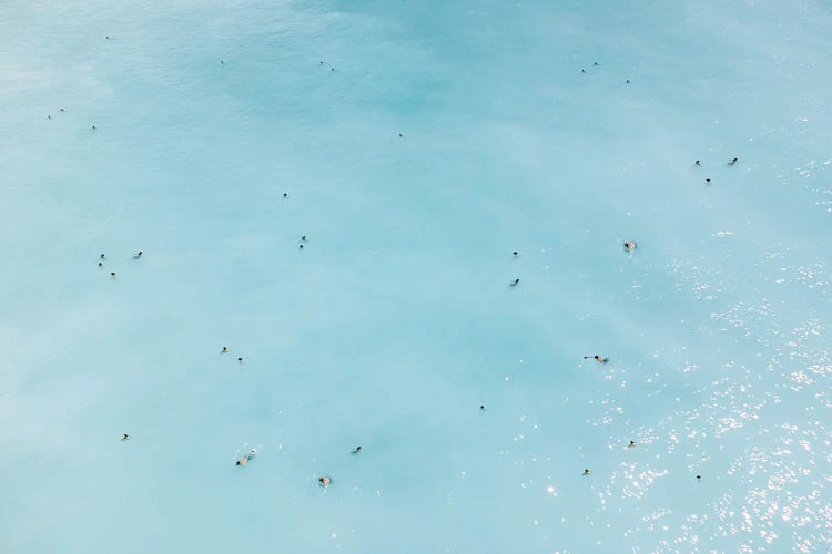 Aerial View Of People Swimming In Sea